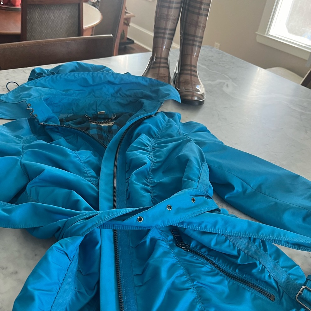 Burberry wind breaker, rain jacket with detachable hoodie.